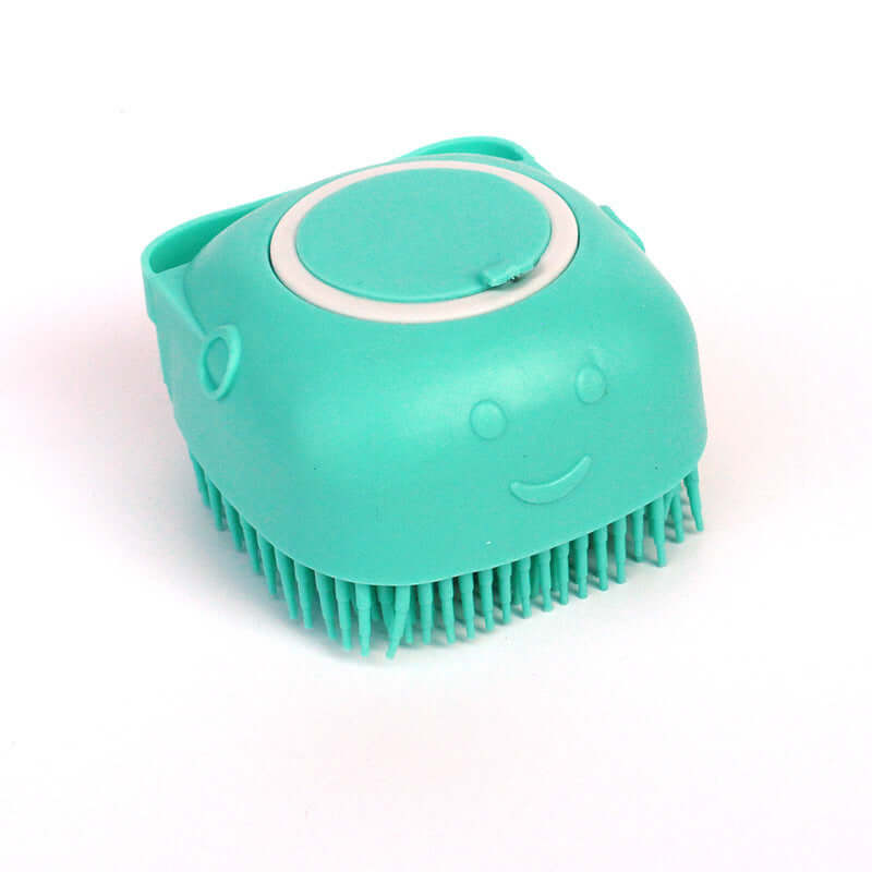 Silicone dog bath massage glove brush for pet grooming, turquoise, gentle cleaning and fur shedding tool.